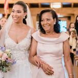 Bride and mother of the bride during wedding ceremony