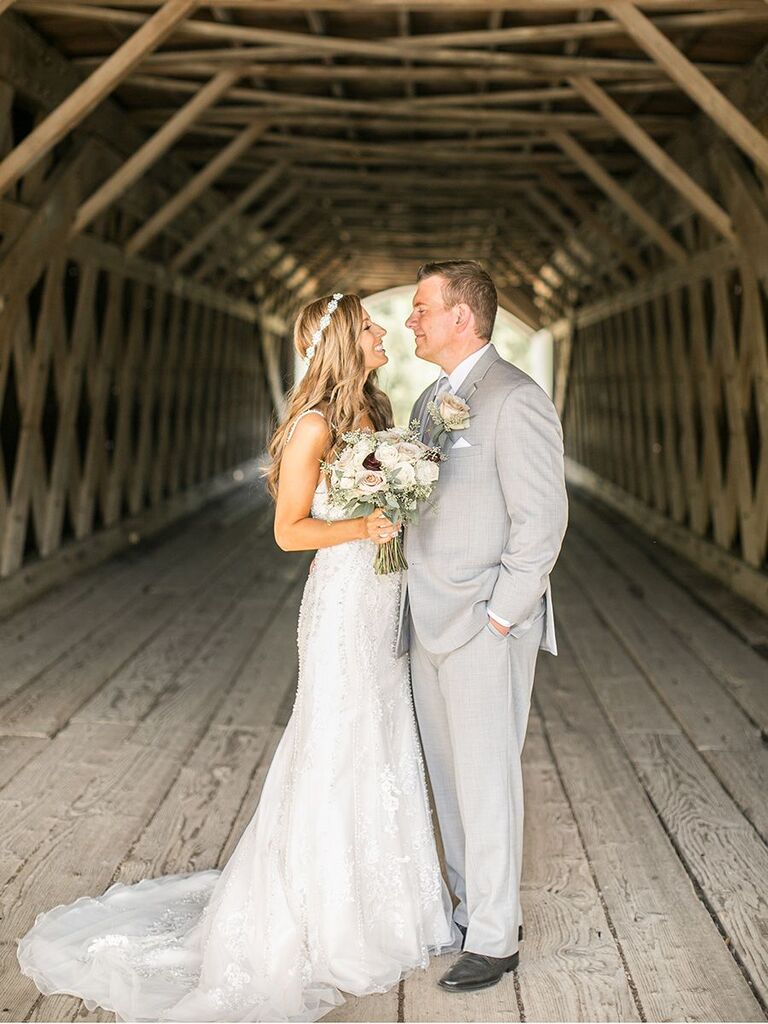 bride and groom in tunnel