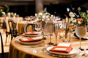 Orange Napkins and Brown Linen on Tablescape