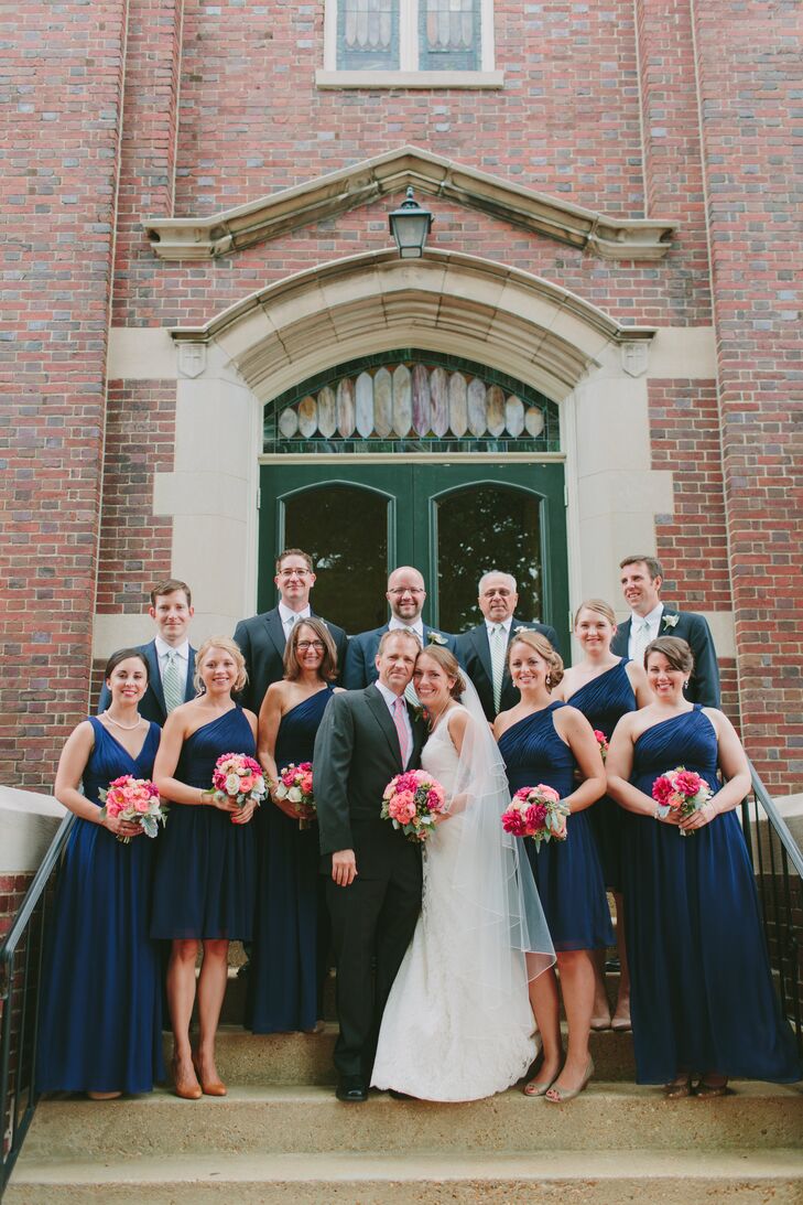 Bridesmaids wore navy Donna Morgan dresses. Groomsmen wore their own suits. "We wanted the feel to be classy and comfortable," Brittany says. "It was important that everything went well together, but not that it be uniform."
