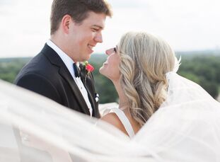 Cari Lewis (27 and a 6th grade language arts teacher) and Brett Cowan's (27 and a CPA) classic wedding was inspired by the designer Kate Spade. "Her f