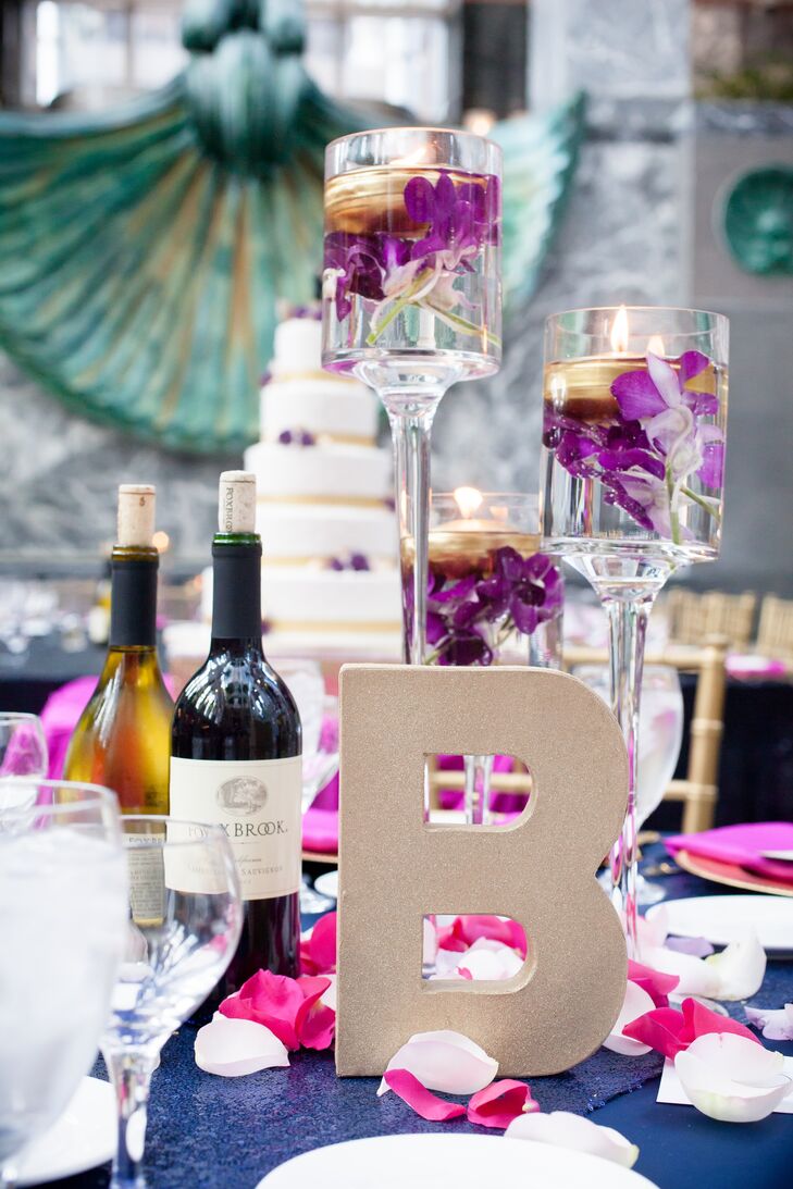 Guests found their seats via oversize gold table letters.