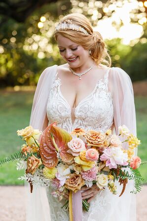 Bride Holding Peach-and-Yellow Bouquet With Anthurium and Roses