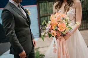Orange Wedding Bouquet With Poppies and Clematis