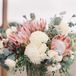 Ivory and Red Floral Arrangement in Basket
