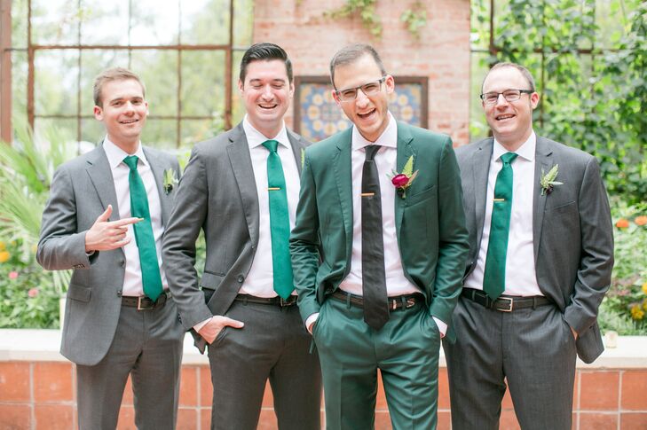Groom in Emerald Green Suit with Groomsmen in Grey Suits