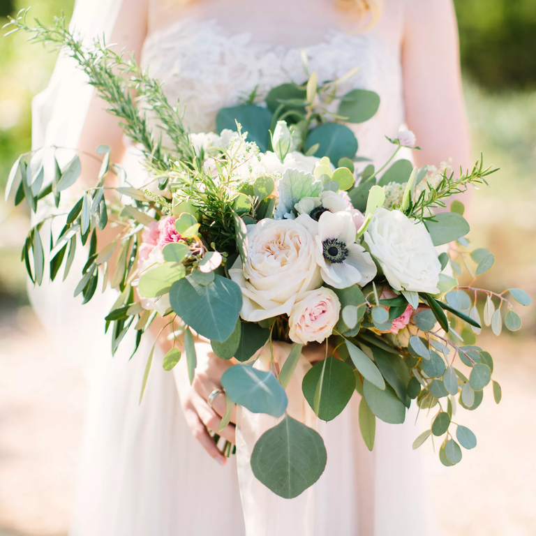 asymmetrical wedding bouquet with roses and eucalyptus