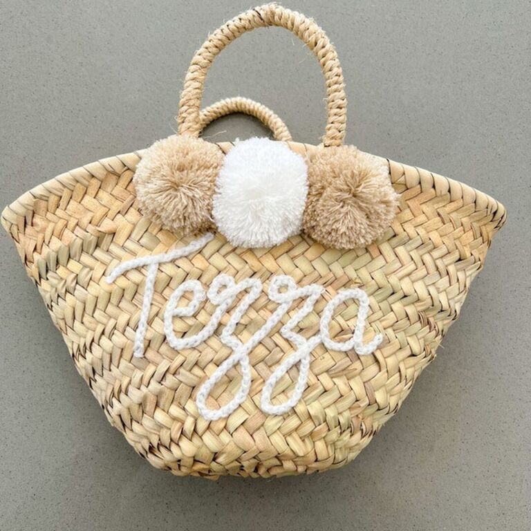 Customized pom pom woven basket from LunaBaskets on Etsy