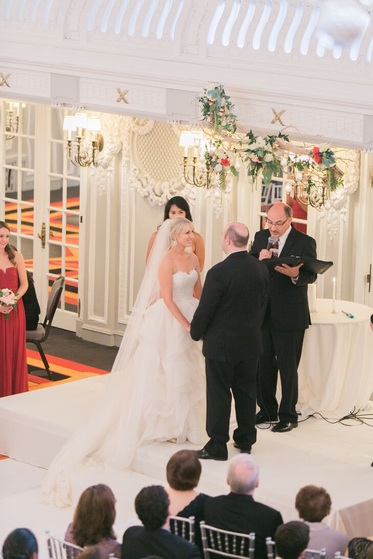 The couple exchanged their vows indoors at the historic Blackstone Hotel. "Light streamed into the room from the wall to wall windows overlooking Lake Michigan," Jessica describes.