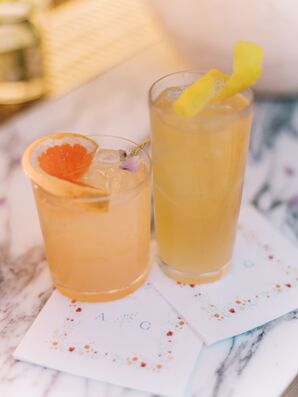 Signature Cocktails With Orange Slice and Lemon Shaving on Custom Cocktail Napkins