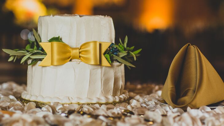 Classy Buttercream Cake with a Gold Bow and Eucalyptus Leaves