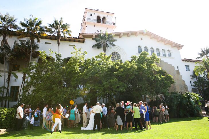 The couple said "I do" in the sunken garden of the Santa Barbara County Courthouse. Guests looked on from simple, white chairs while Sarah and Joshua sealed the deal under a pair of palm trees.