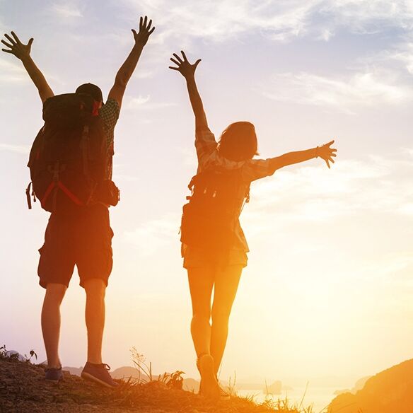Couple hiking at sunset