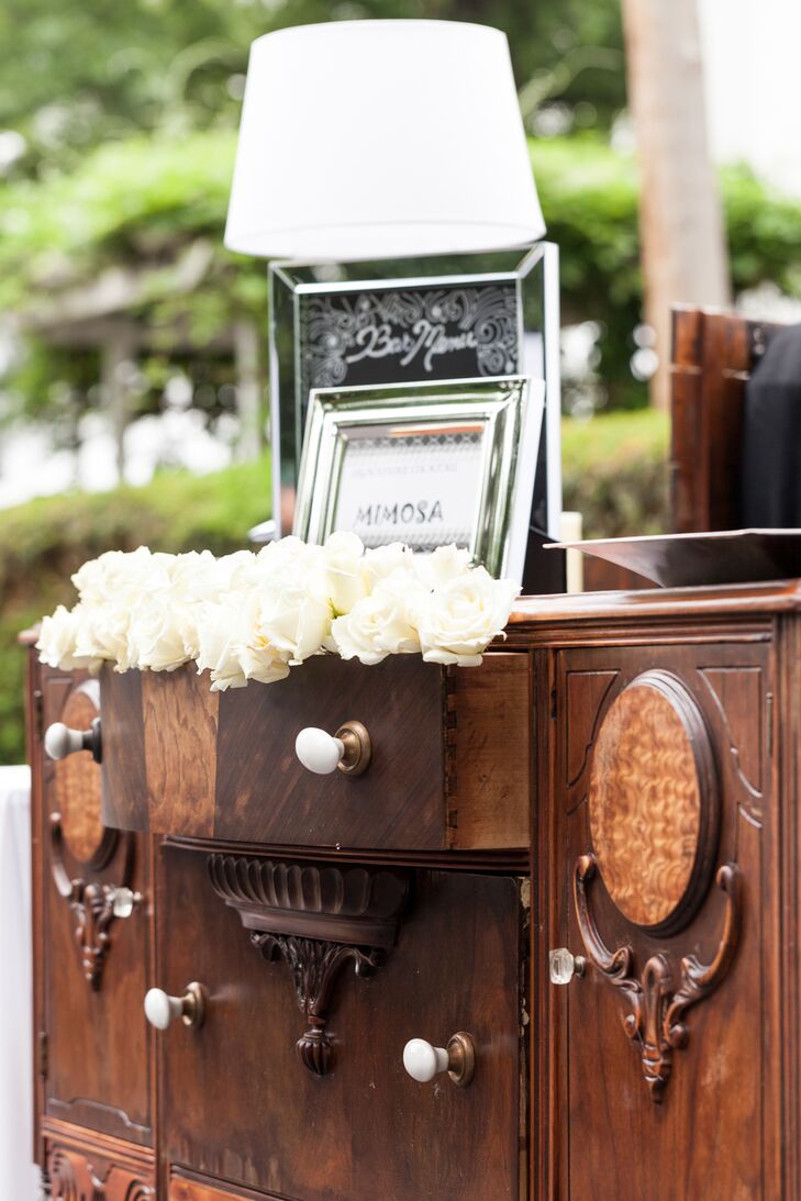Ivory Roses in Antique Wooden Furniture