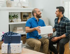 Couple opening trending 2023 wedding registry gifts 