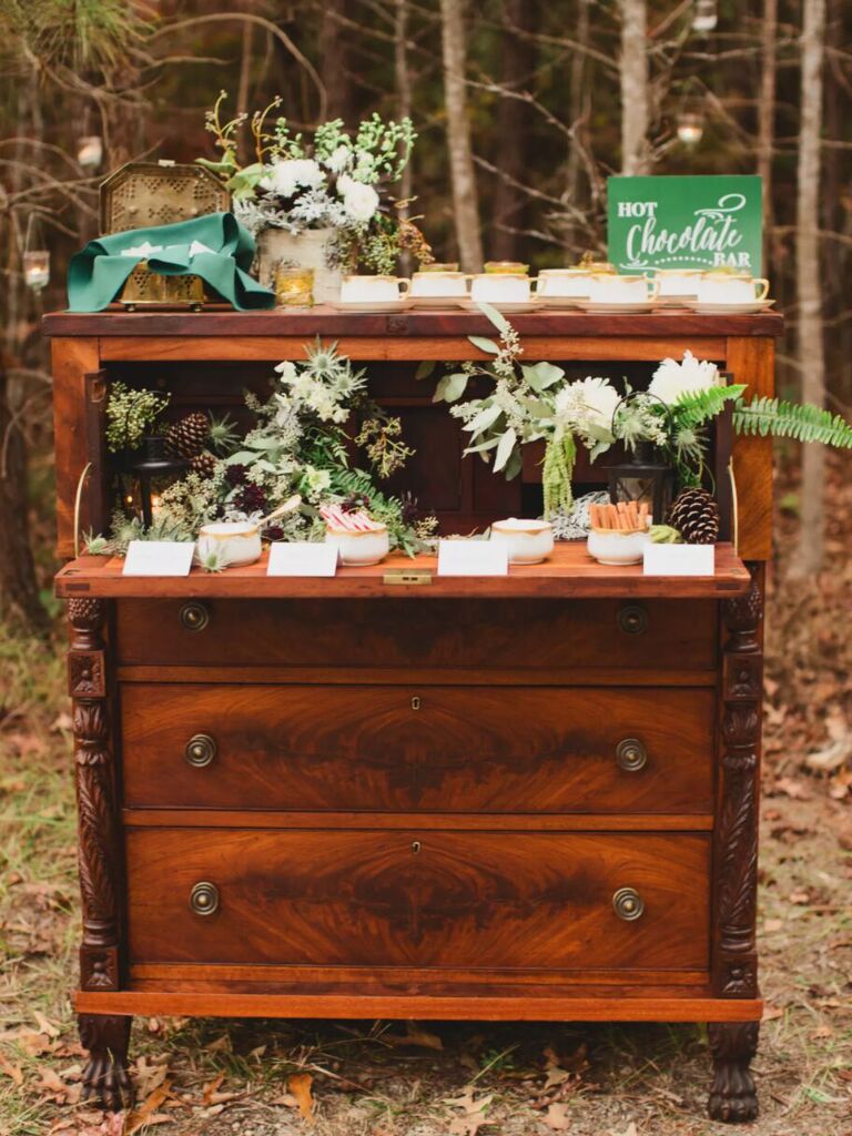 winter wedding idea DIY hot chocolate station on vintage wooden dresser