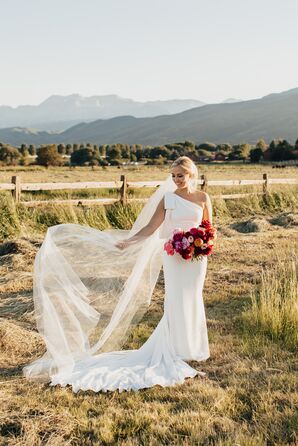 Bride in One-Shoulder Wedding Dress With Veil