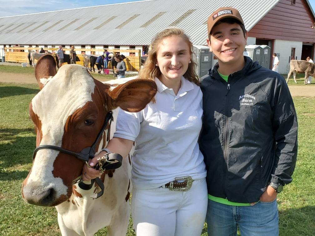 Evan's first cow show watching Meg show her cows at her last 4-H fair!