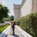 Jackie and Bryan paused for a moment on the stone-tile walkway outside the Cleveland Museum of Art in Cleveland, Ohio, where their wedding took place. They embraced each other in the middle of the sunny summer day.