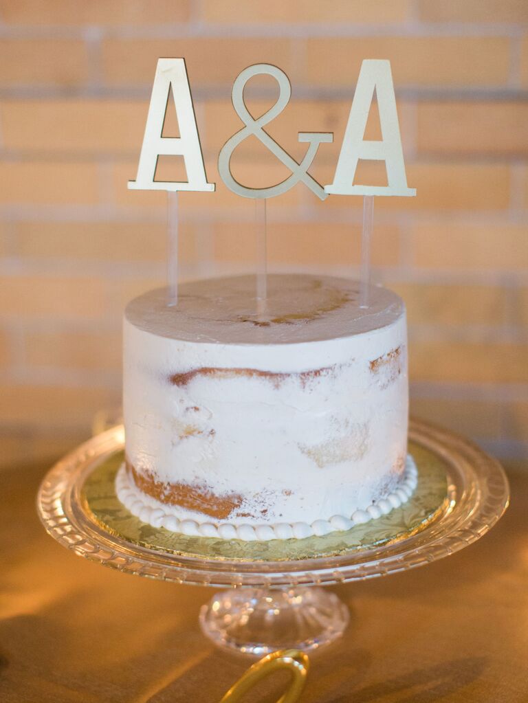 simple one tier wedding cake with A & A cake topper 