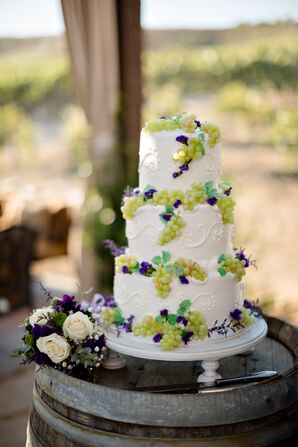 Ivory Wedding Cake Accented with Grape Decor