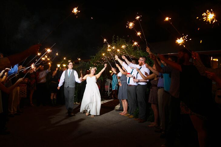 At the end of the night, Mindy and Marcus's family members and friends sent them off in a blaze of sparklers.