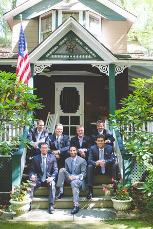 Groomsmen Dressed in Gray Suits Pose on Stairs