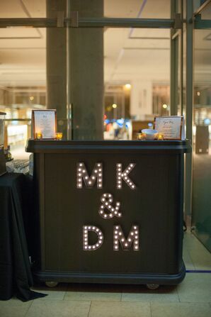 Couple Initials in Lights on Bar
