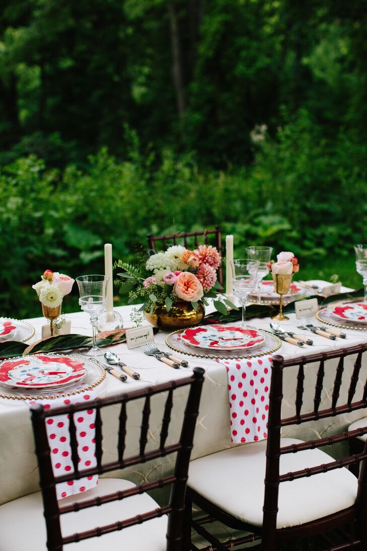 The colorful place settings included white and red polka-dot napkins and flamingo plates.