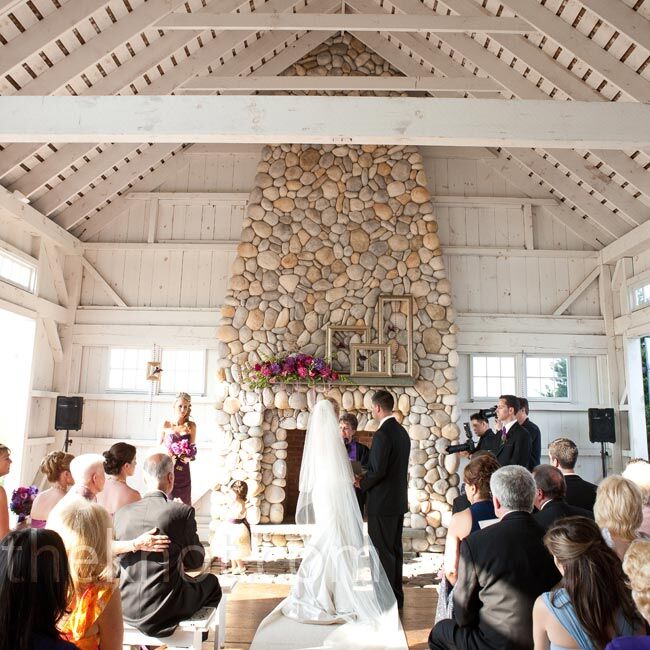 A glittery gold aisle runner added a little glam to the chapel’s weathered-wood and stone interior.