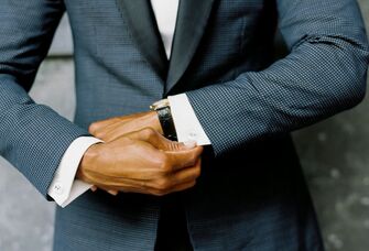 Groom looking at watch