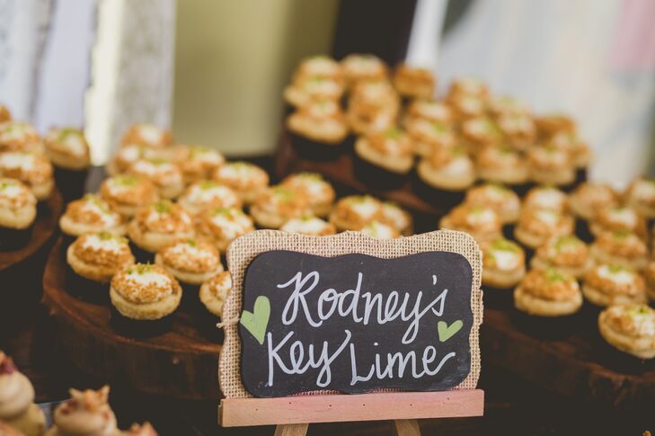 The dessert table was filled with all their favorite treats. Sweetness Bakeshop made Key lime mini cupcakes for Rodney, maple-bacon-flavored cupcakes for Roxy and vanilla bean cupcakes for his daughter. Each one was piled onto a wooden tier, fitting the rustic, vintage vibe.