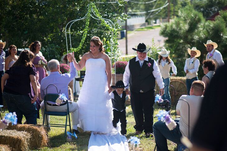 Lacey and Sara high fived their guests as they took their first steps as a married couple.