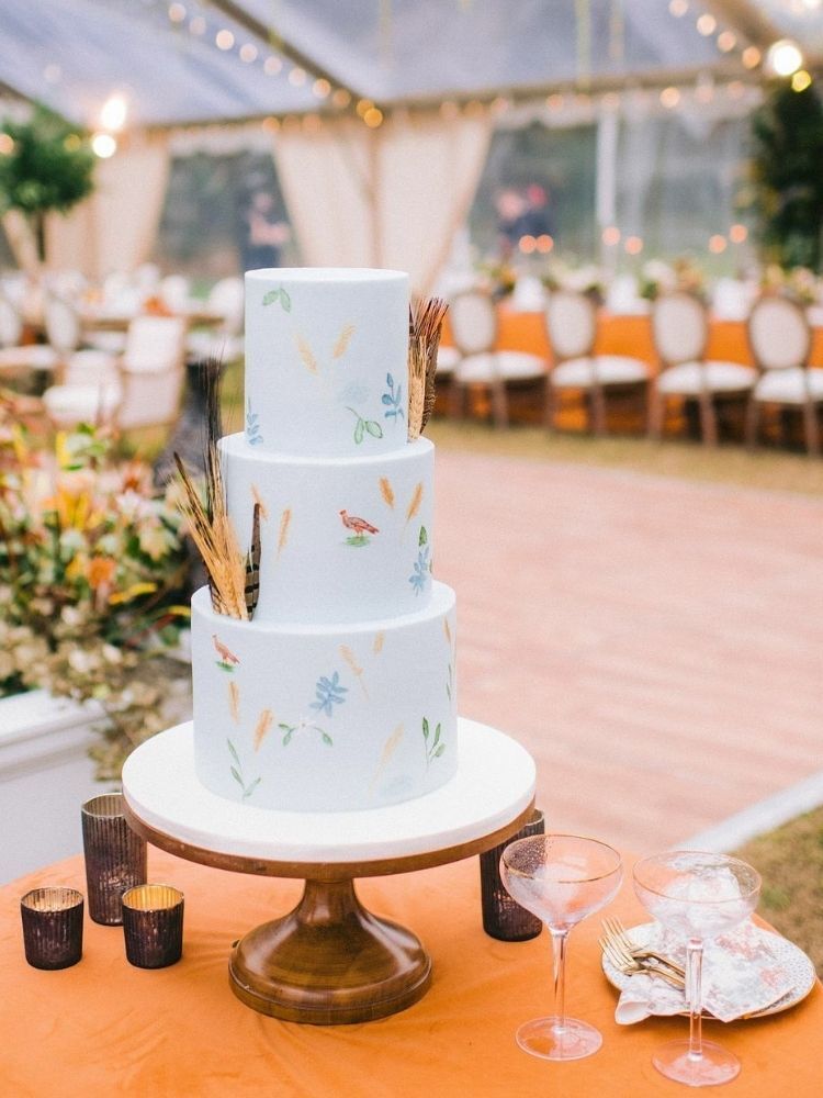 three-tier pale blue wedding cake for rustic summer wedding
