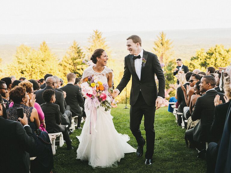 couple walking down aisle
