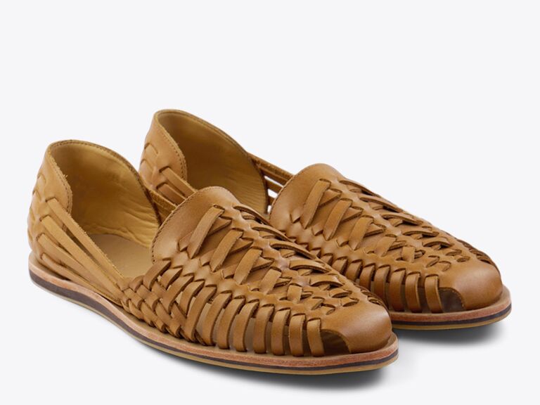 Leather sandals with intricate weaving. 