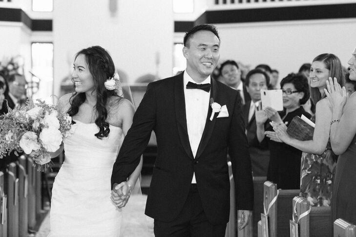 Joyce wore an ivory Gemma by Vera Wang mermaid wedding dress with blush sequin and rosette detailing. “My jewelry consisted of a cross bracelet given to me by my father, and two bracelets from Van Cleef & Arpels, a wedding gift from Jae,” says Joyce. Jae wore a classic black Hugo Boss tuxedo with Prada dress shoes.