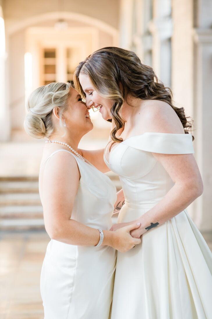 Brides Sharing Embrace During Wedding Portraits