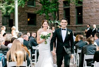 couple at wedding recessional