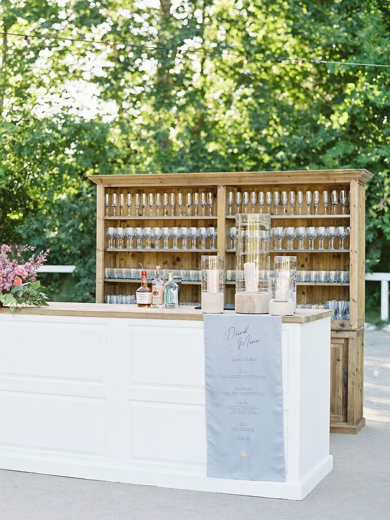 Pillar candles with outdoor bar top for wedding reception space
