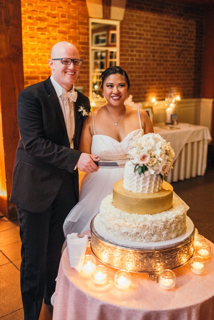 Michelle and Thorsten chose a gold and white three-tier cake by Magnolia Bakery. Each tier had was different: a lemon cake with strawberry jam, a hummingbird cake and a red velvet cake with vanilla buttercream.