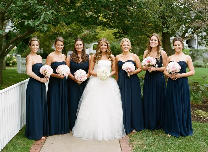 Caity’s six bridesmaids wore long chiffon Monique Lhullier dresses. “I picked the color, length and fabric and then let the girls pick out their individual styles,” says Caity. Everyone has different body types and doing this allowed all of them to look great.” As bridesmaid gifts, she gave each girl a navy “Island Tie” bracelet from C.B. Stark in Edgartown to wear on the wedding day.
