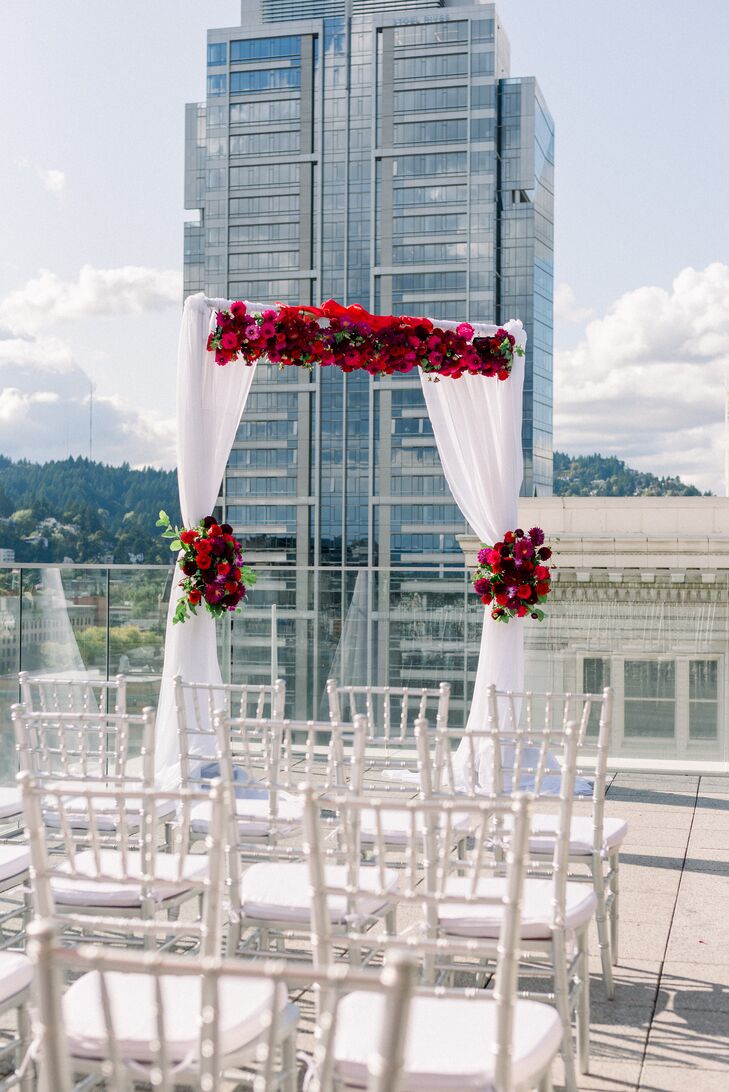 Modern Rooftop Mandap with White Draping and Red Flowers