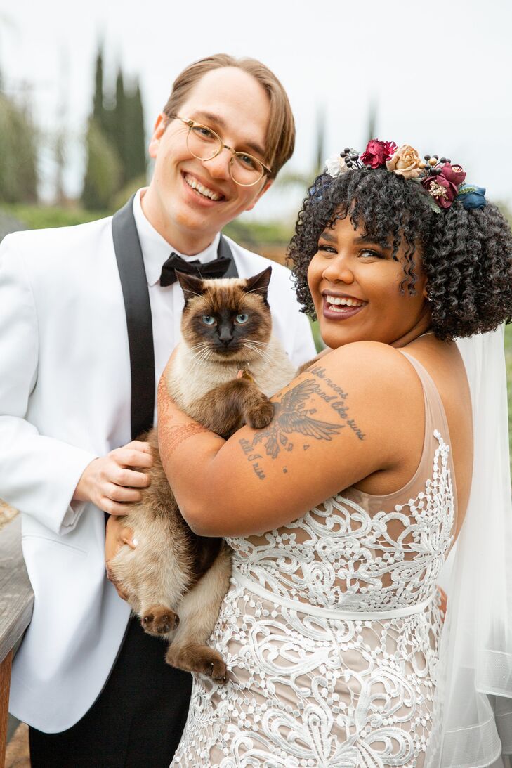 Couple Holding Pet Cat at Riverbed Farms in Anaheim, California