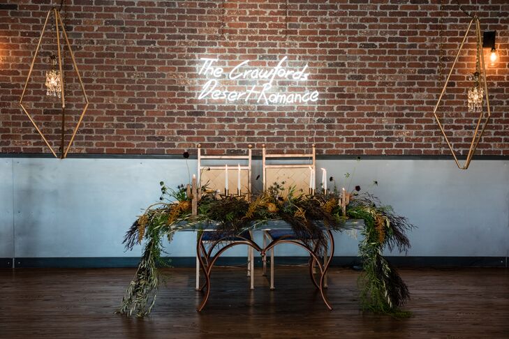 Calligrapher L Shannon Designs crafted the font for the signs, menus, escort marble tiles and geometric wooden pieces. "Her work was definitely one of the most special parts of our wedding," Christa says.