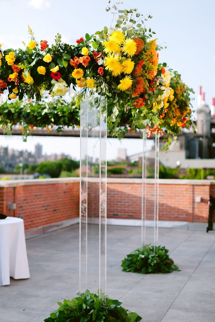 Acrylic Chuppah with Red, Orange and Yellow Flowers