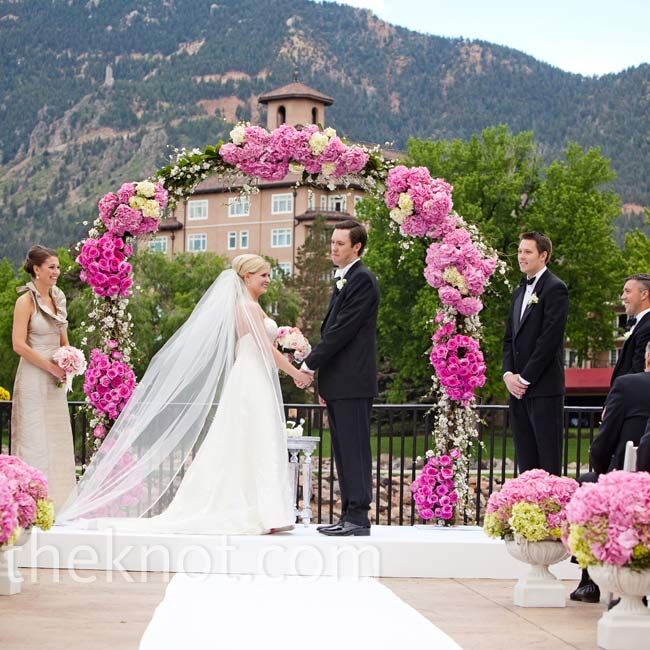 Views of Cheyenne Mountain set the scene for the couple's picturesque nuptials on the Lakeside Terrace.