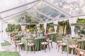 Woodland-Themed Tented Wedding Reception With Green Linens and Cross-Back Chairs