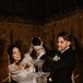 Newlyweds Pour Prosecco on Glass Tower at Destination Wedding in Italy