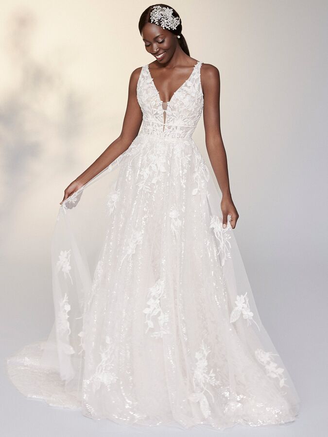 Justin Alexander Signature A-line wedding dress with sequined underlay